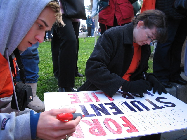 SSFLers working on a poster at the Walk for Life